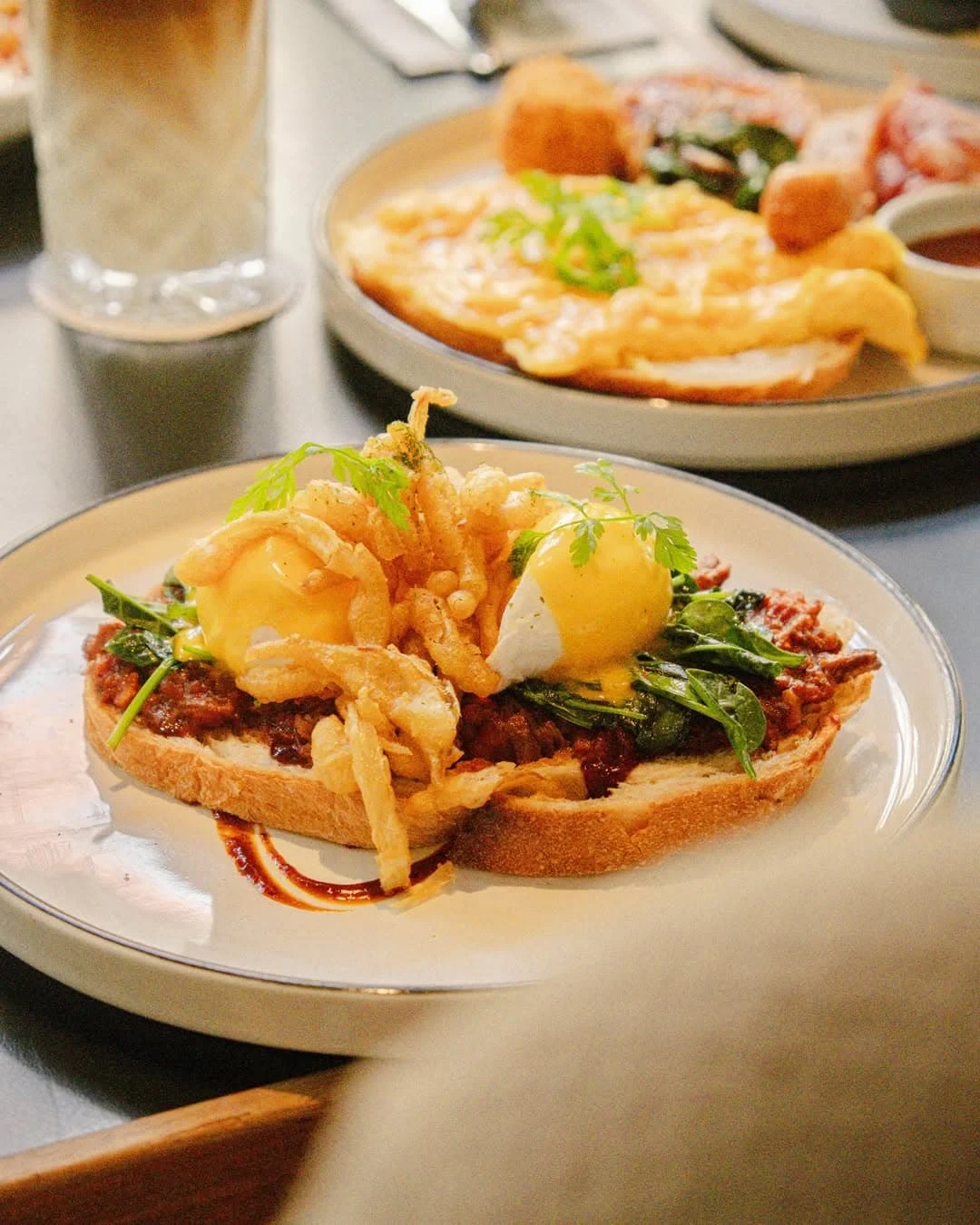 Poached eggs, baby spinach, and slow-cooked beef