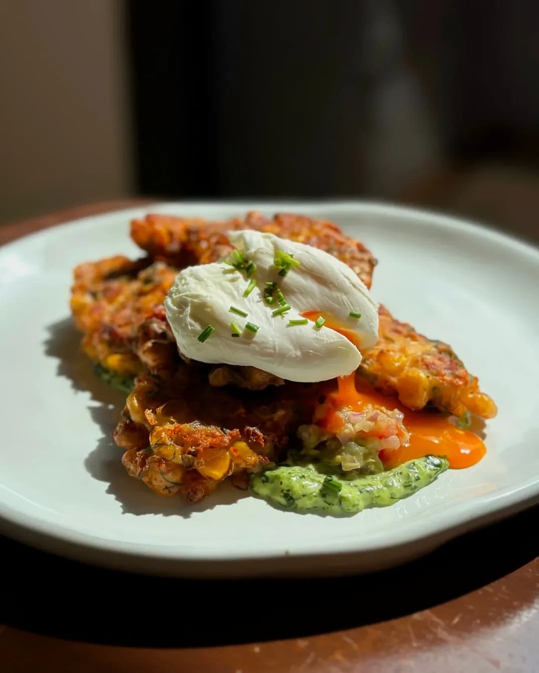 Corn fritters with poached egg