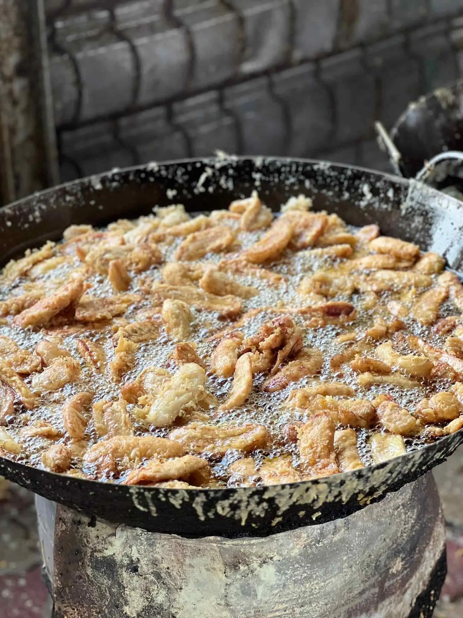 Goreng pisang as they're fried in the wok