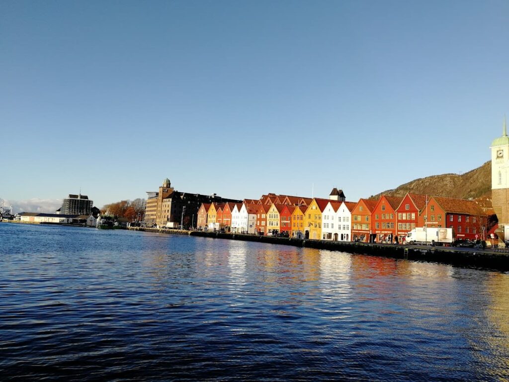 colorful wooden houses by water in bryggen bergen norway
