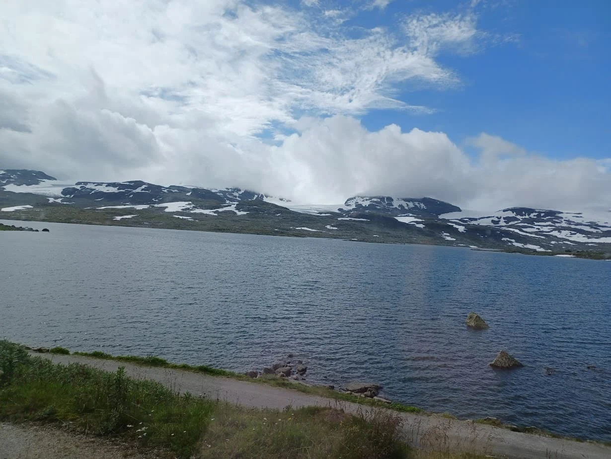 view of a lake from bergensbanen train near finse in norway