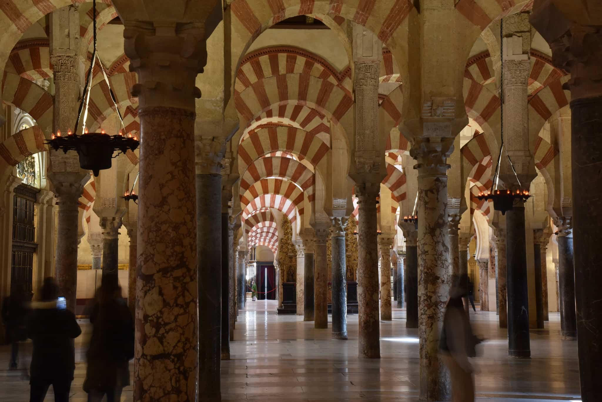 The striped archways are a common feature of the Moorish architecture from this time period