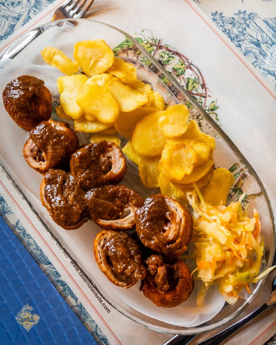 Traditional Spanish dish comprises meat and potatoes