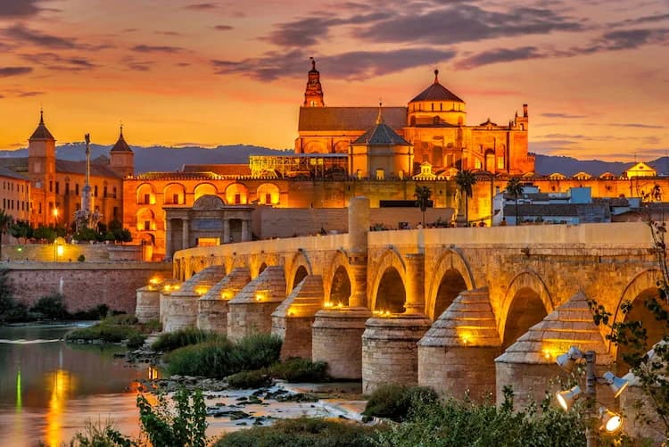 Lit up around dusk: the Roman Bridge