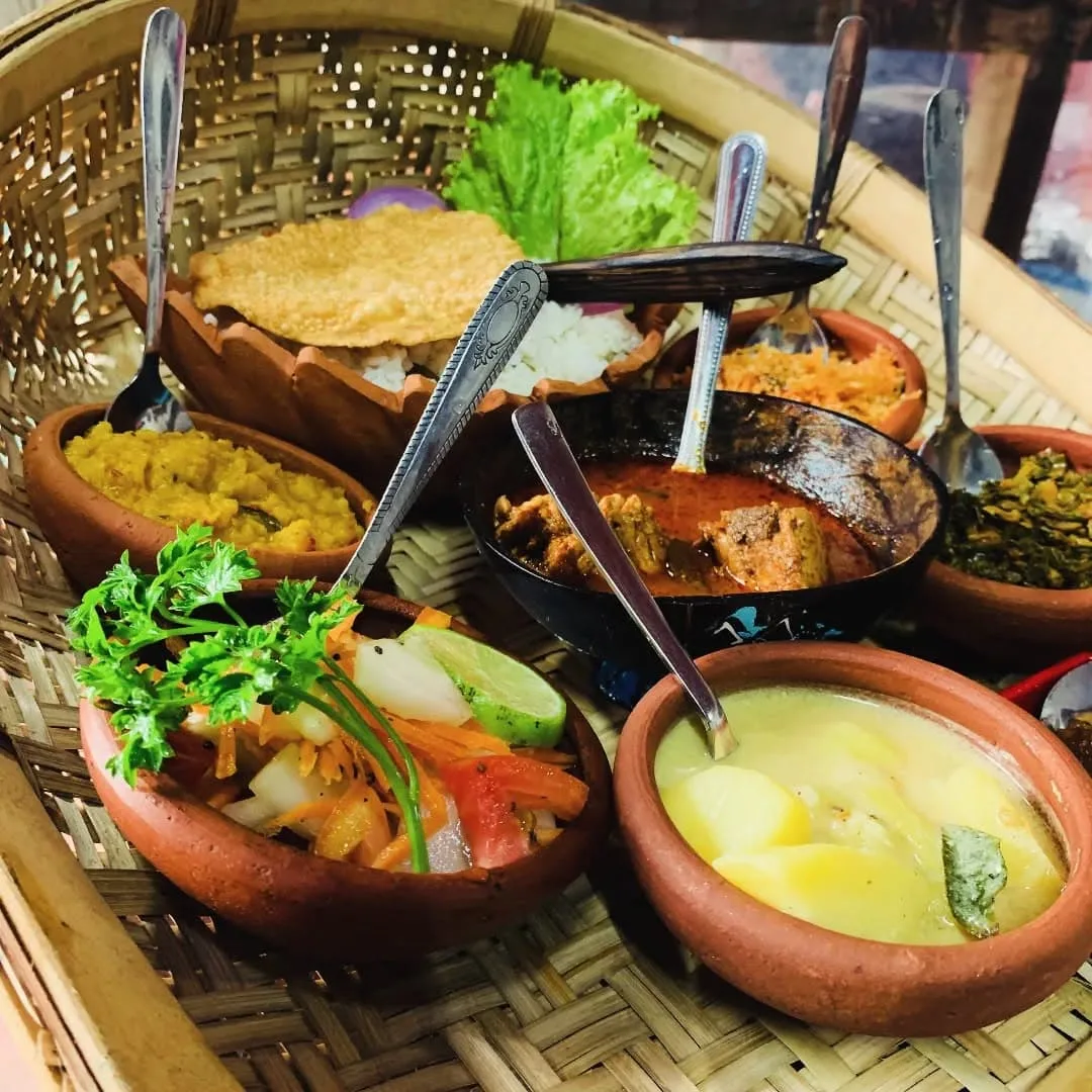 A selection of curry, dahl and sambals