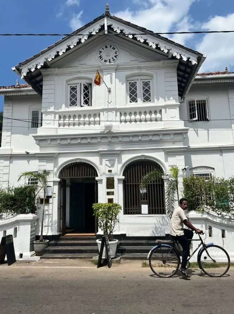 The exterior of Club Ceylon set up in a colonial style building