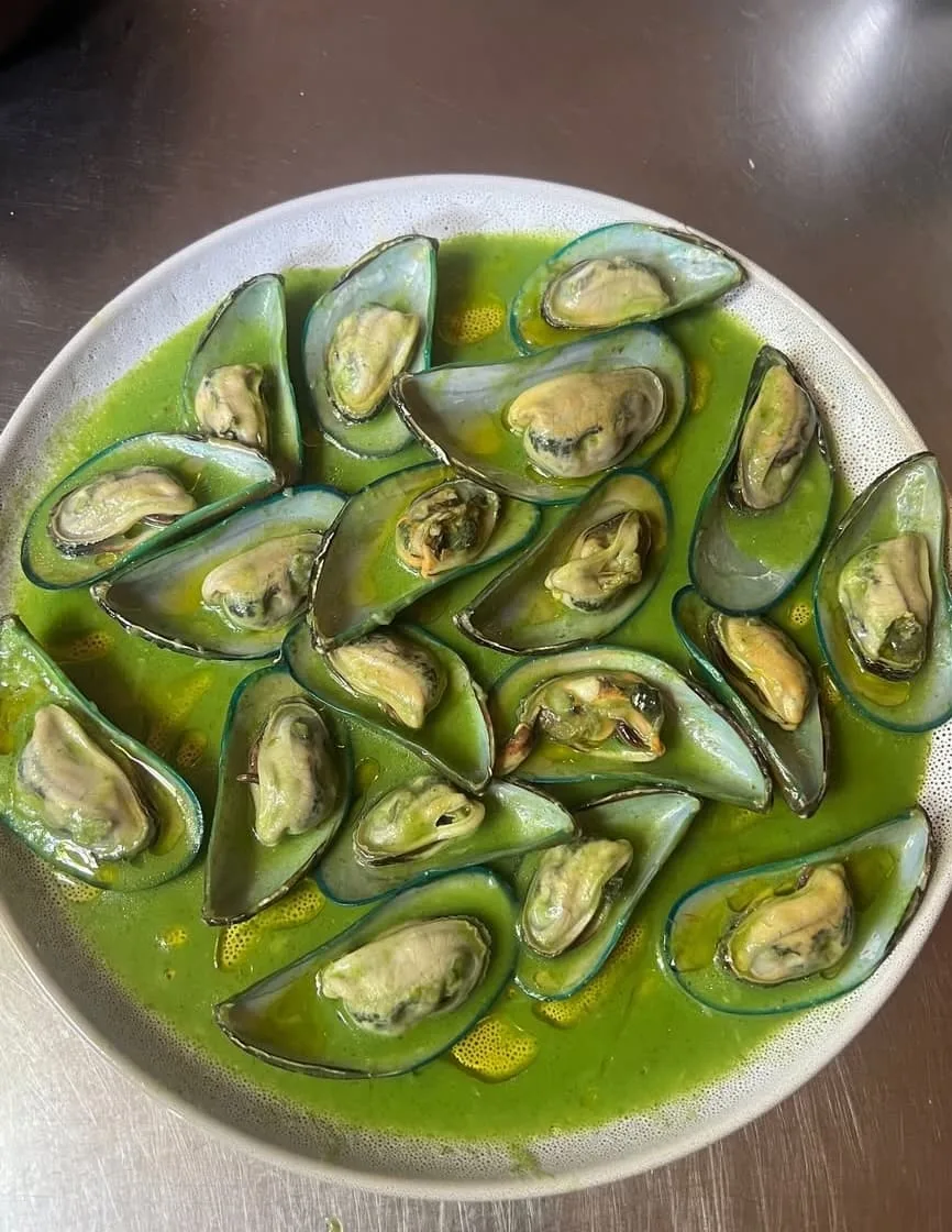 Mussels in a bright green parsley broth