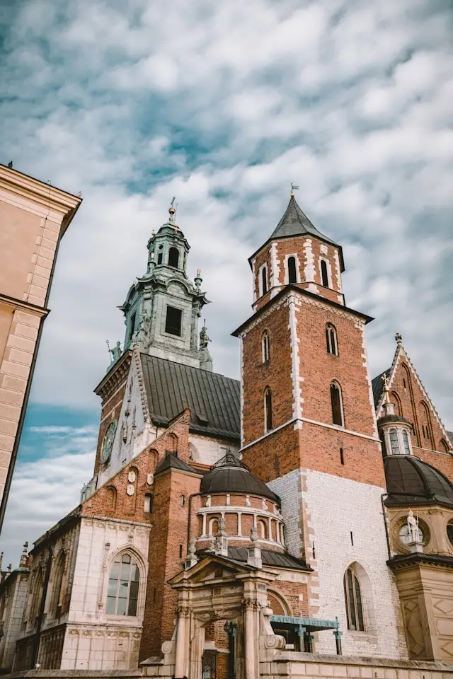 blue and brown towers on medieval wawel castle in krakow poland