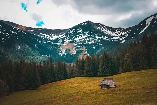 a snow covered mountain peak in the tarta mountains poland
