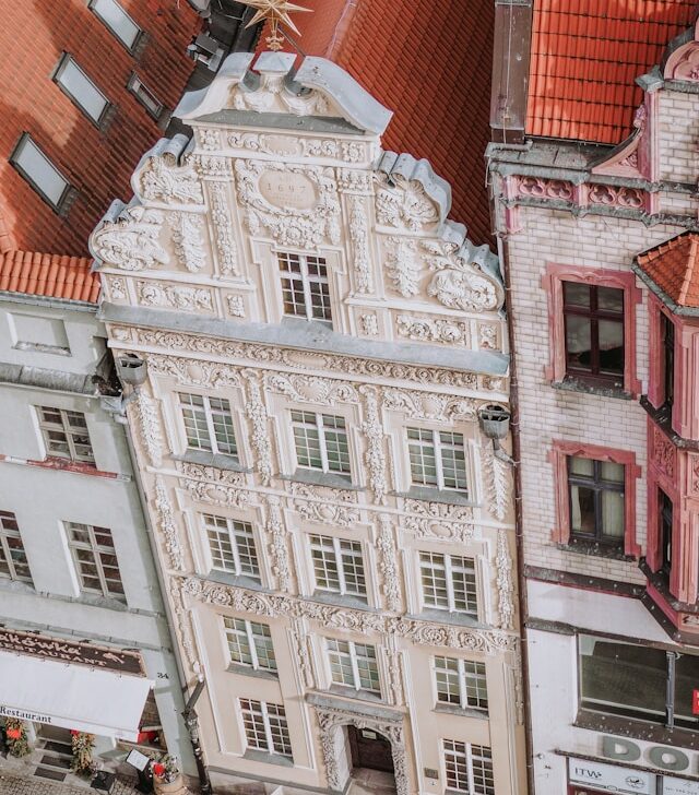 a tall medieval townhouse in the old town of torun poland