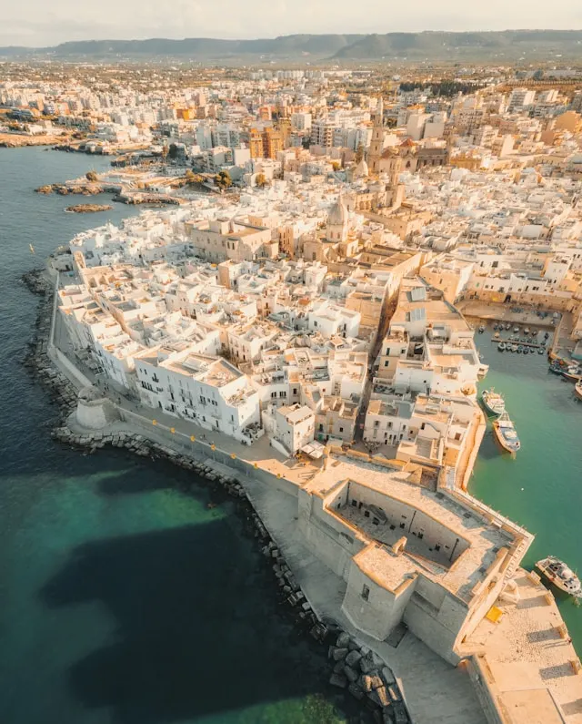 castello carlo v stands at the entrance to monopoli old town by the harbour in puglia italy