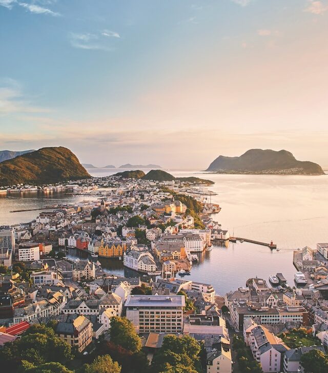 an aerial view of alesund norway looking out to the harbour and north sea