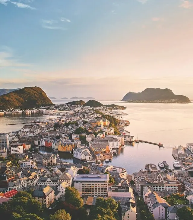 an aerial view of alesund norway looking out to the harbour and north sea