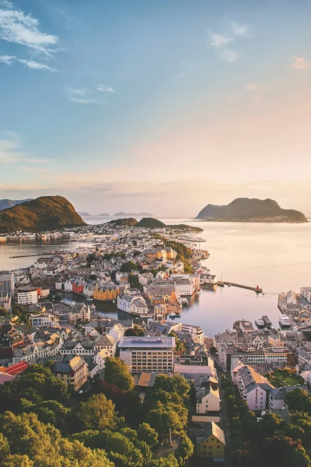 an aerial view of alesund norway looking out to the harbour and north sea