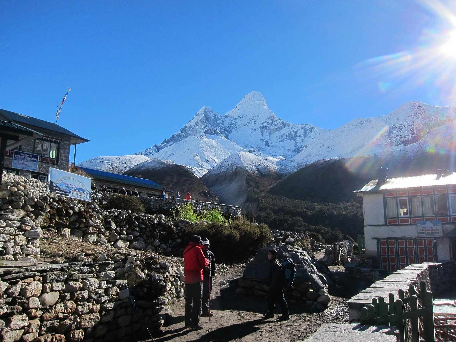 Remote tea house in Nepal with mountains in the background 