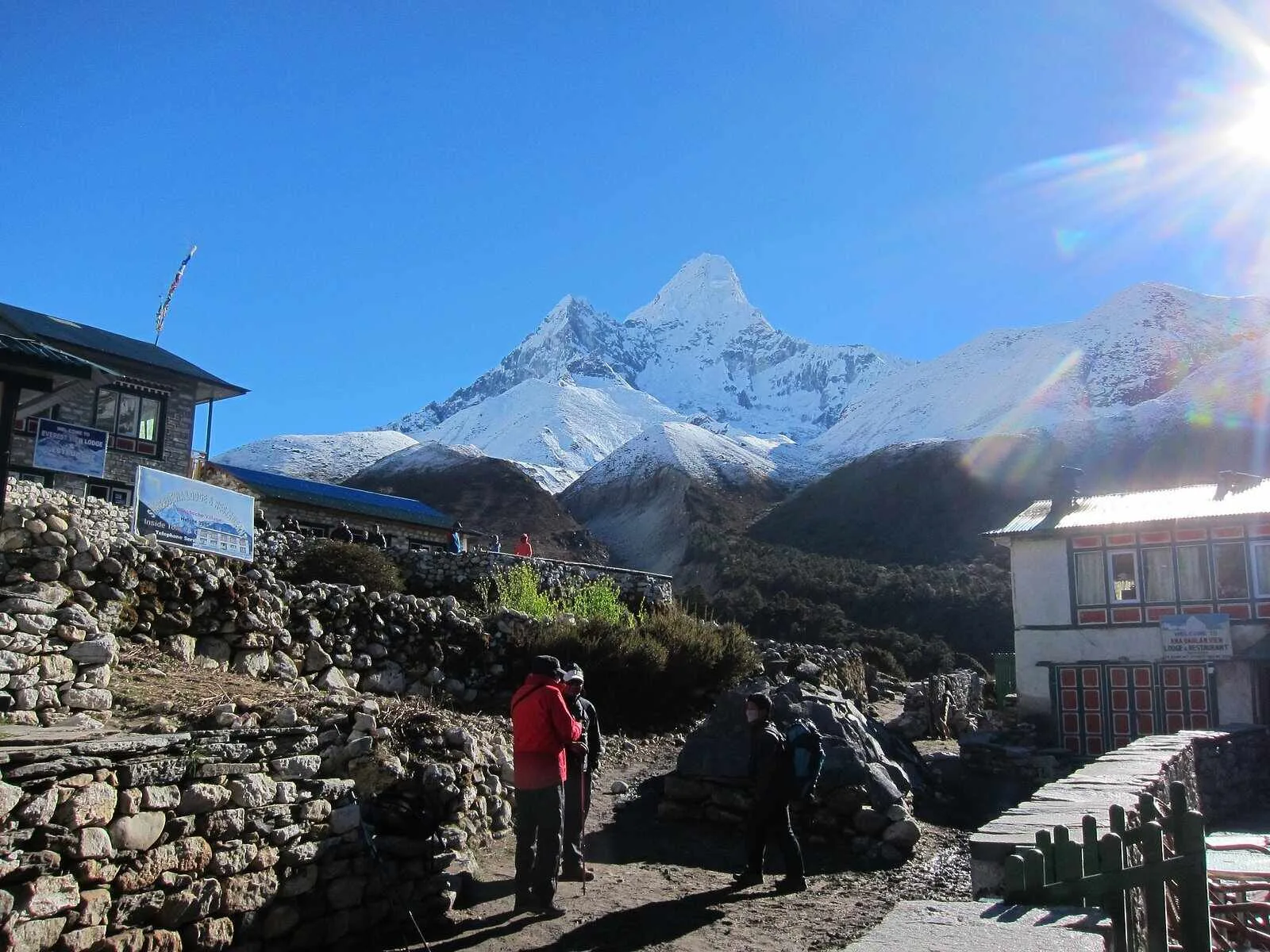 Remote tea house in Nepal with mountains in the background
