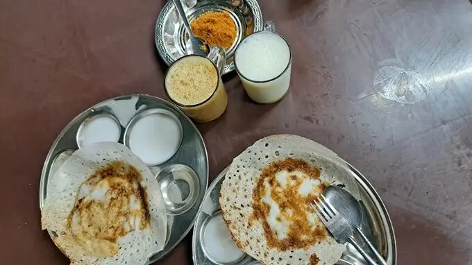 Plate of appam with lassi