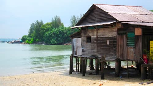 Beach with kampong style house