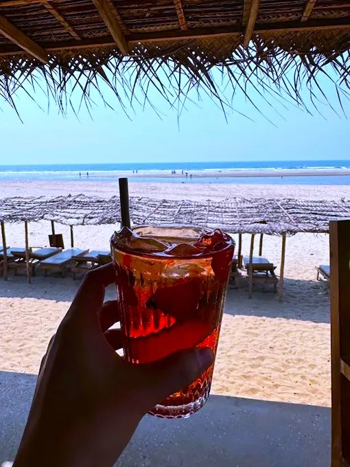 Drink in front of the ocean in Goa