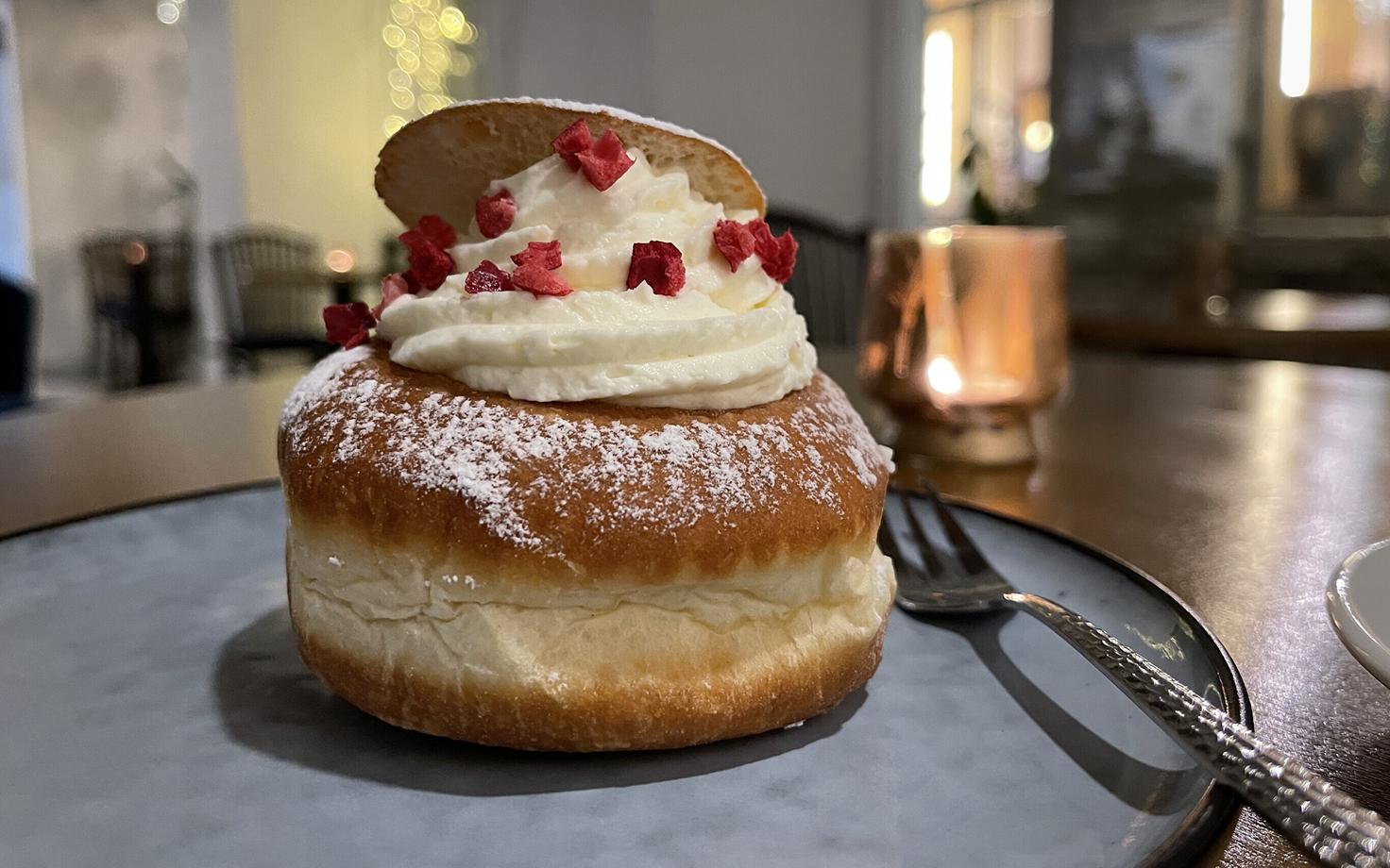 vastlakukkel are sweet buns topped with cream a popular traditional estonian food