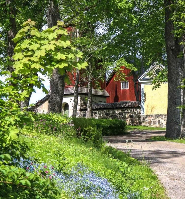 Traditional houses by a meadow at Fagervik