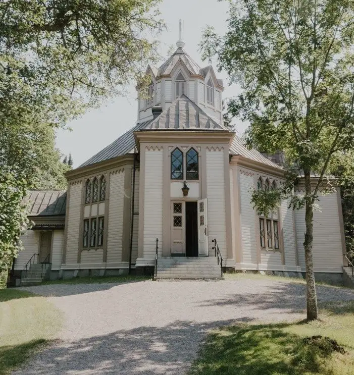 The beautiful white church of Strömfors seen from the front