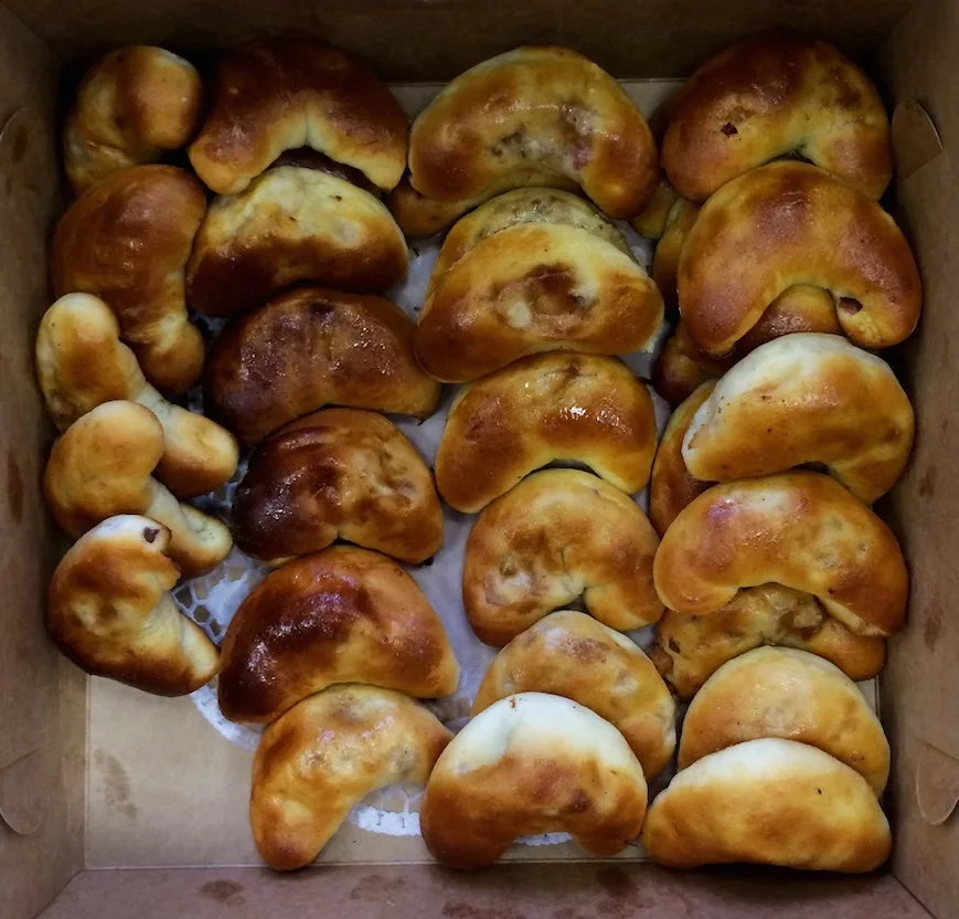 spekrausi are a latvian traditional food comprising of a pastry shell stuffed with bacon