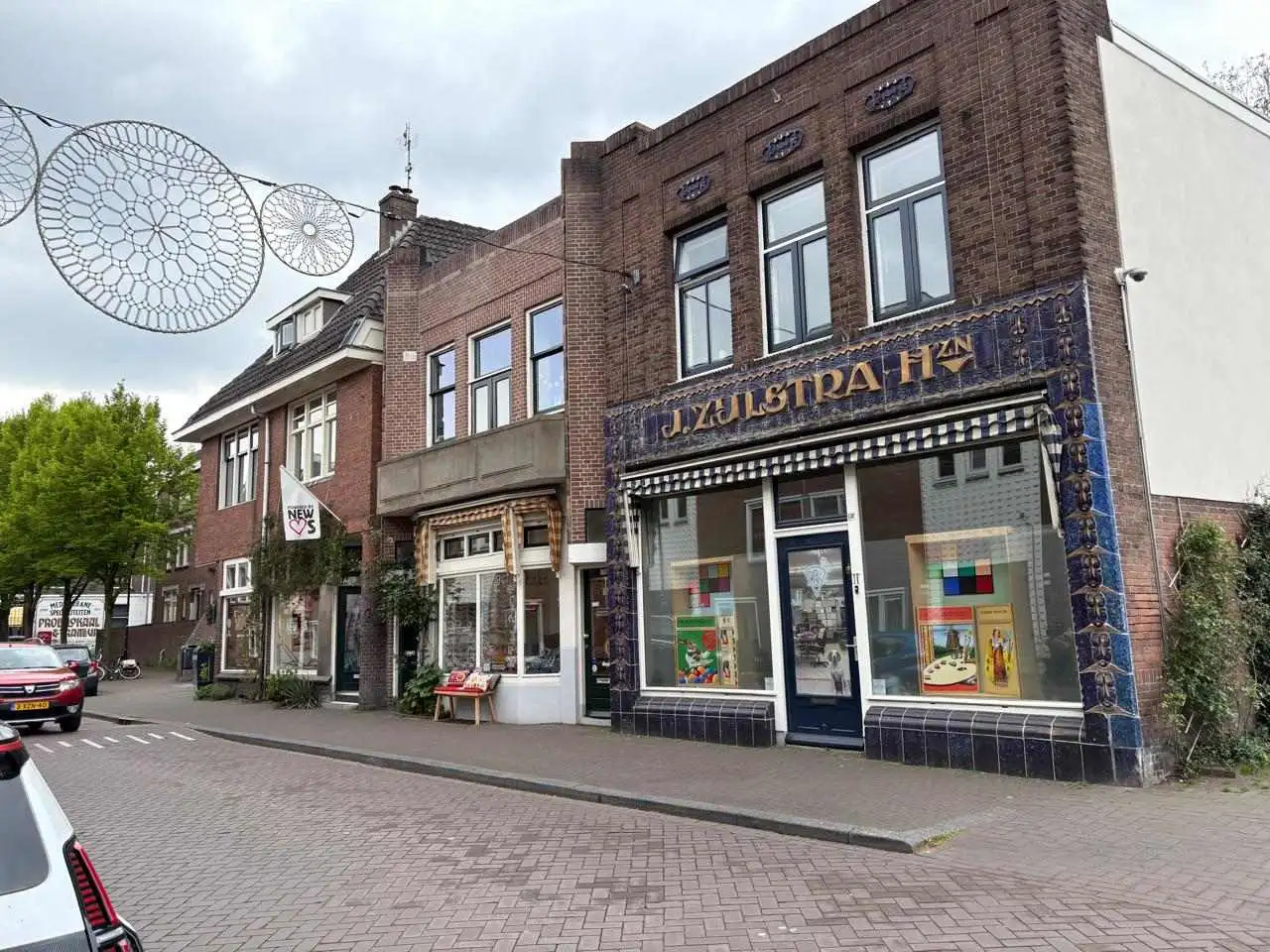 A street view with Dutch houses and artistic decorations