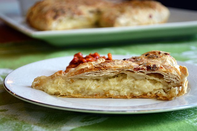 a plate of gibanica, a traditional serbian cheese pie
