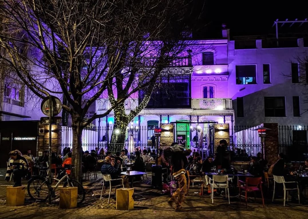 The bustling outdoor seats at this bar and club around Alameda De Hercules