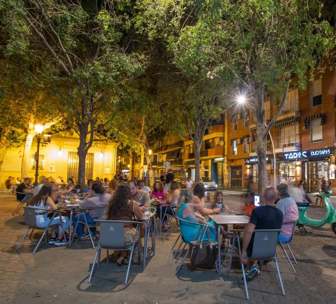 Lively and busy outdoor seating at this bar