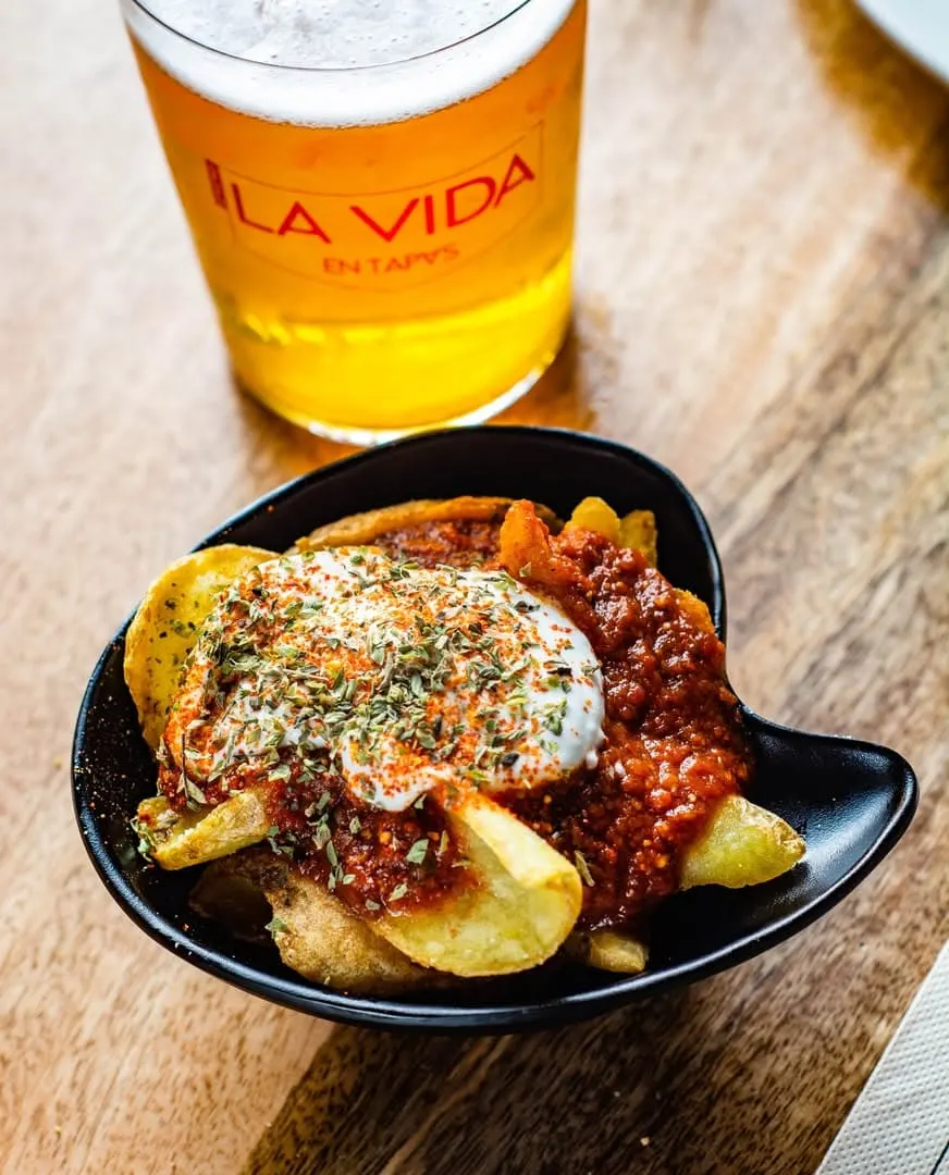 Spanish beer and patatas bravas