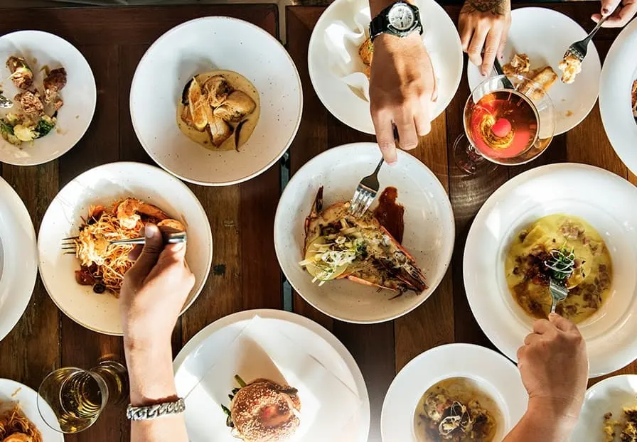 An array of dishes from this eatery including meat and seafood