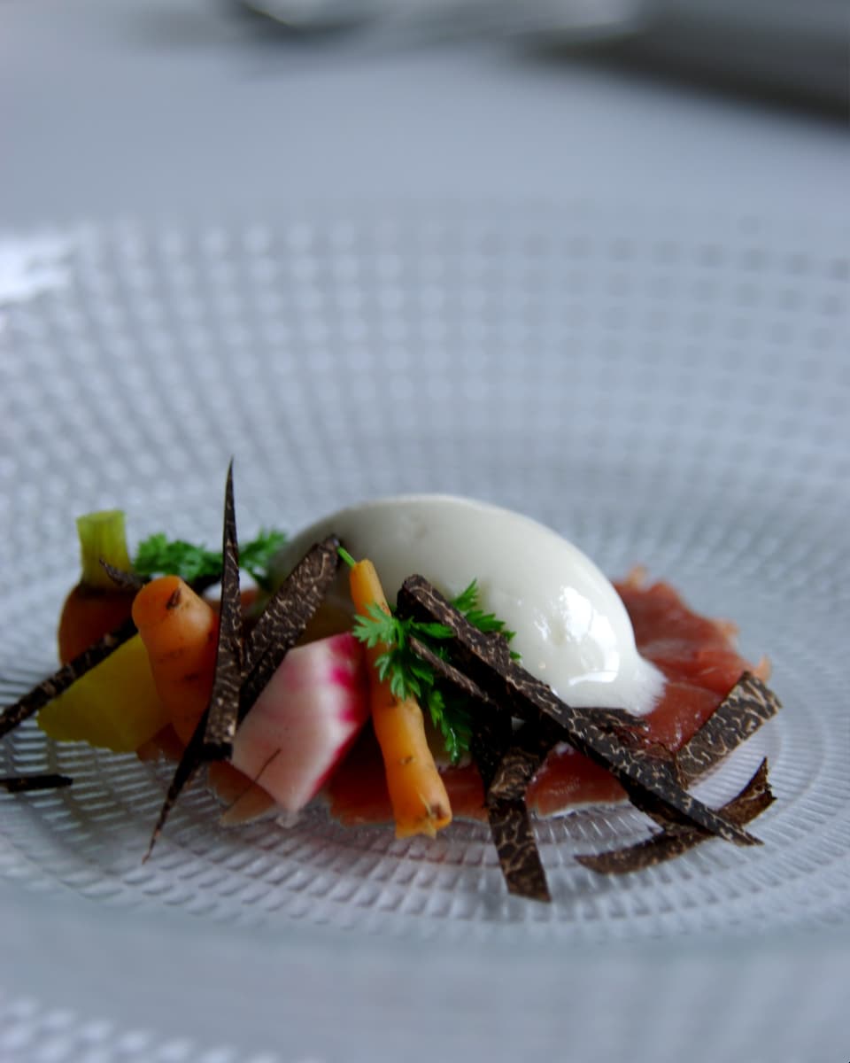 Truffle and vegetables on carpaccio