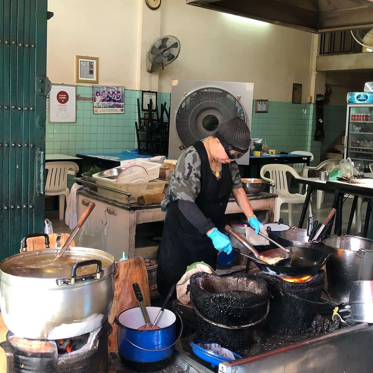The iconic Thai food star in action wearing her signature goggles