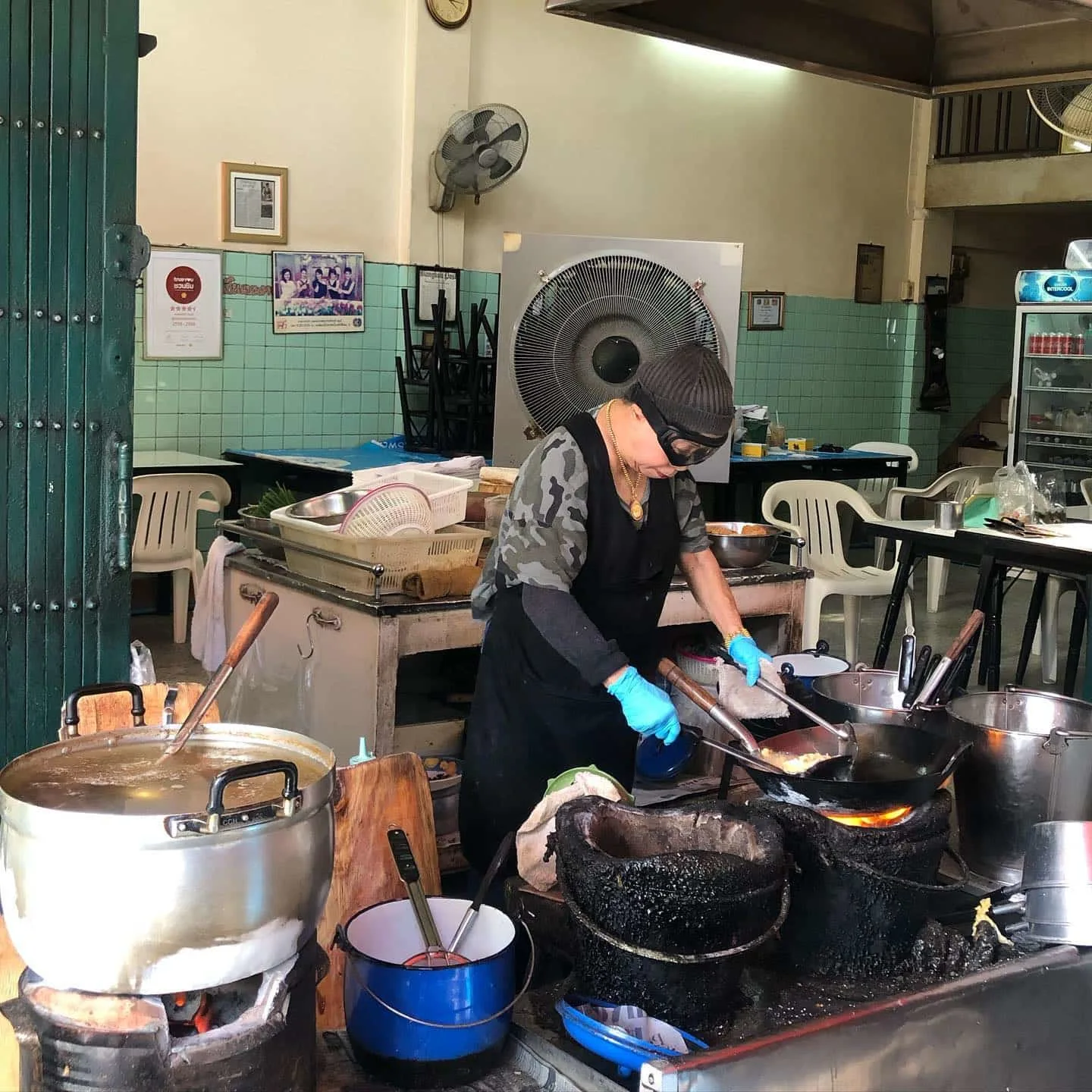 The iconic Thai food star in action wearing her signature goggles
