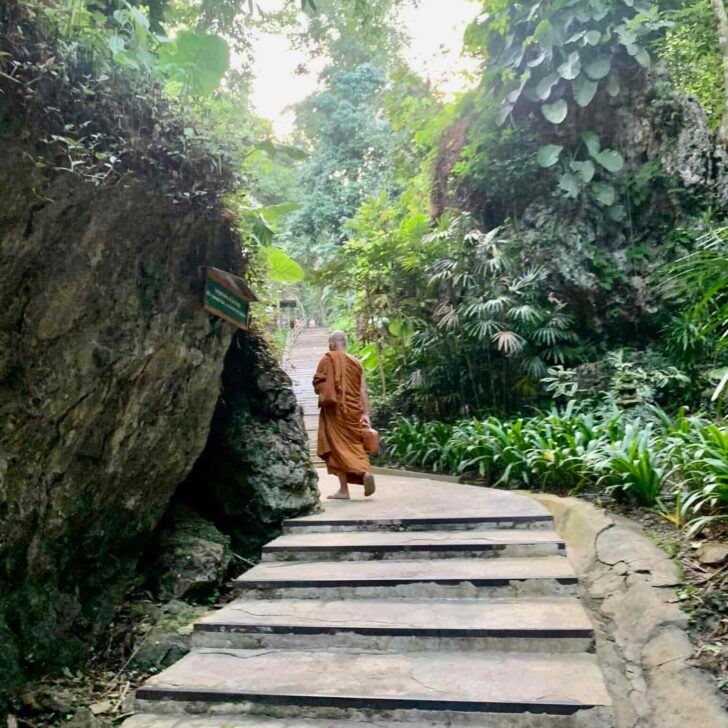 A monk walking 500 steps to the temple in Chiang Dao