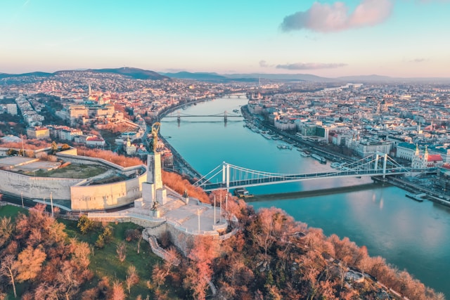 the river danube flowing through budapest hungary with buda castle in the foreground