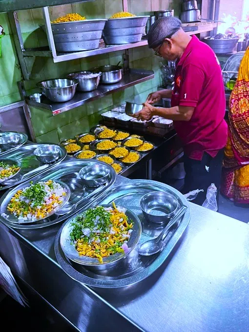 A tea stall serving Indian breakfast foods