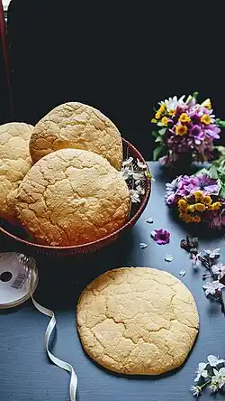 traditional albanian cookies called ballokume on a blue tablecloth