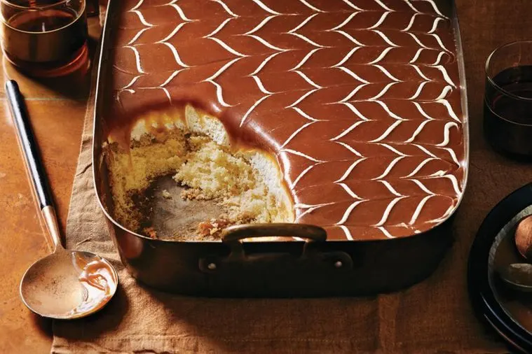 a cake tin containing trilece three milk cake one of the most popular albanian desserts