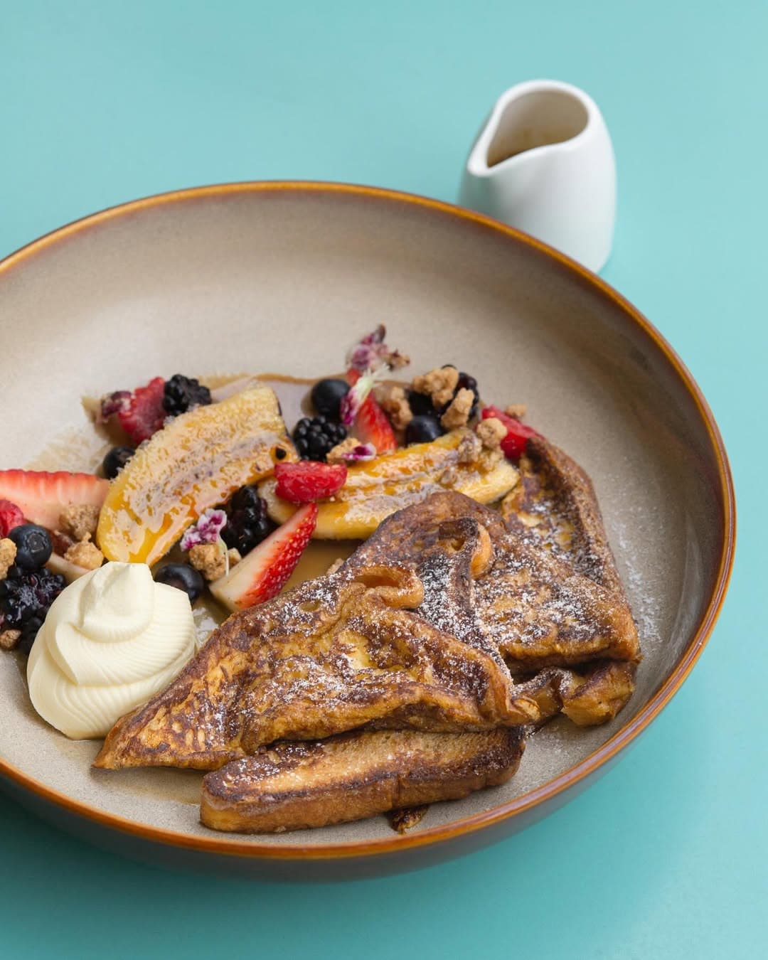 French toast with caramelised banana and fresh berries