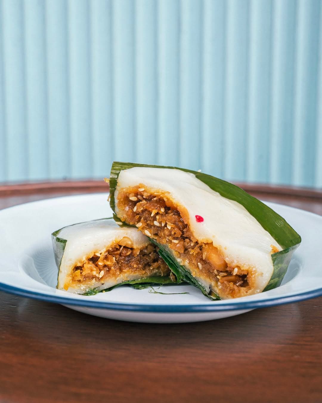 Yi Bua Kueh with coconut, palm sugar, ginger, peanuts and sesame seeds