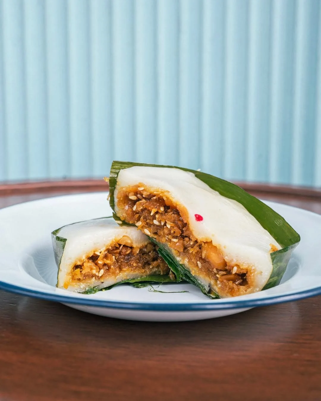 Yi Bua Kueh with coconut, palm sugar, ginger, peanuts and sesame seeds