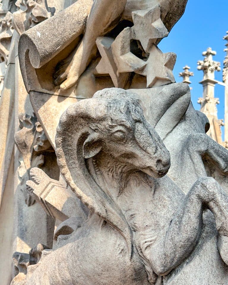 Gothic sculptures of the Duomo di Milano - goat and stars