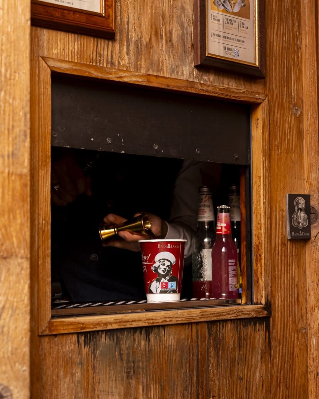 Cocktail window at Backdoor 43 bar