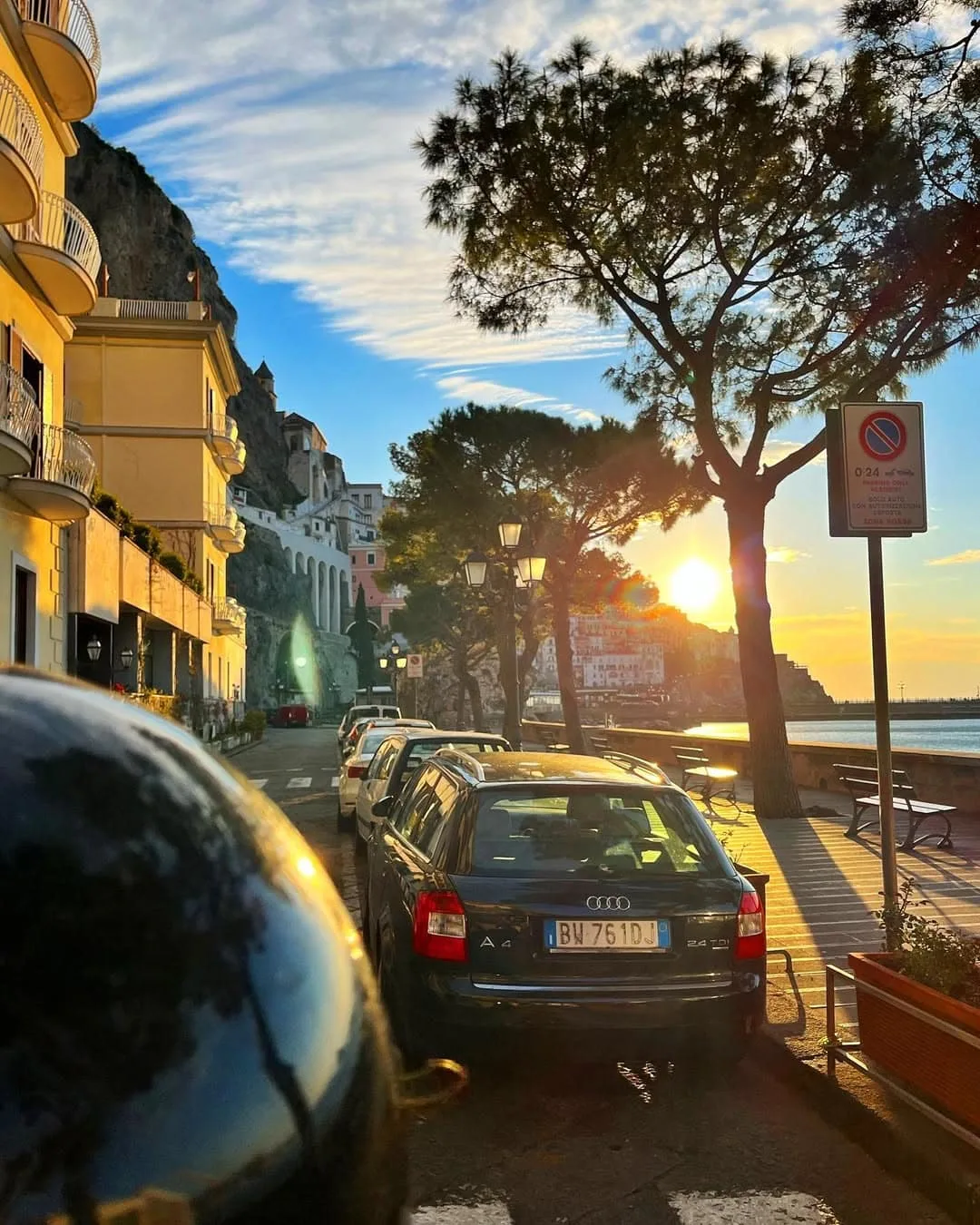 Cruising through Amalfi town early in the morning via moped
