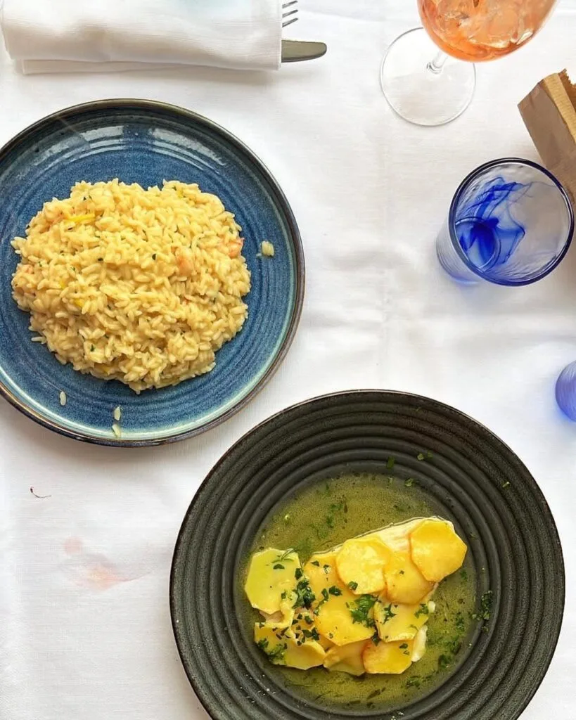 Lunch in positsano risotto and fish with potato