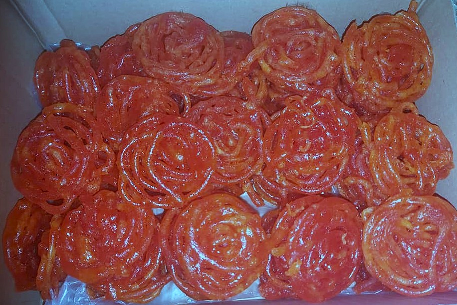 Box containing jalebi, a popular street food in Delhi, India