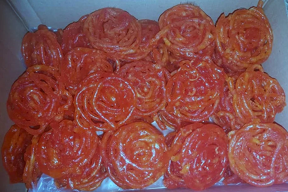 Box containing jalebi, a popular street food in Delhi, India